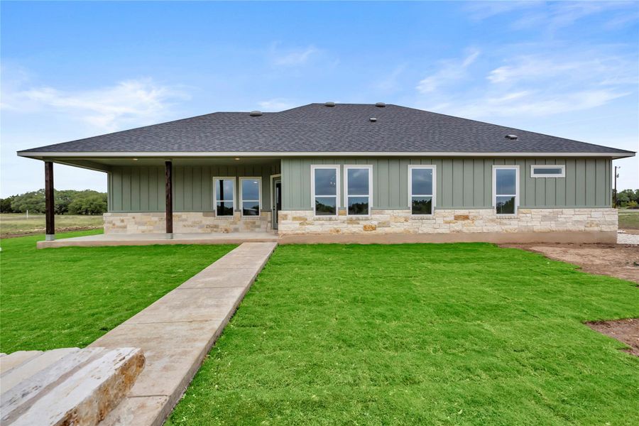 Front exterior of a new home in , Bertram, TX, highlighting curb appeal (Image 20).