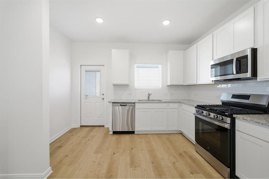Furnished interior view inside a new home in Westridge, McKinney (Image 4).