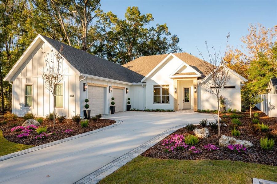 Front exterior of a new home in , Newberry, FL, highlighting curb appeal (Image 1). Front exterior of a new home in , Newberry, FL, highlighting curb appeal (Image 1).