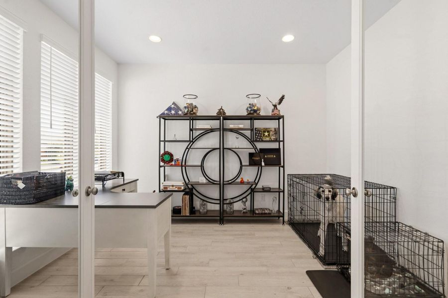 Dedicated office space conveniently located on the main level, offering flexibility for working from home, studying, or use as a multipurpose room