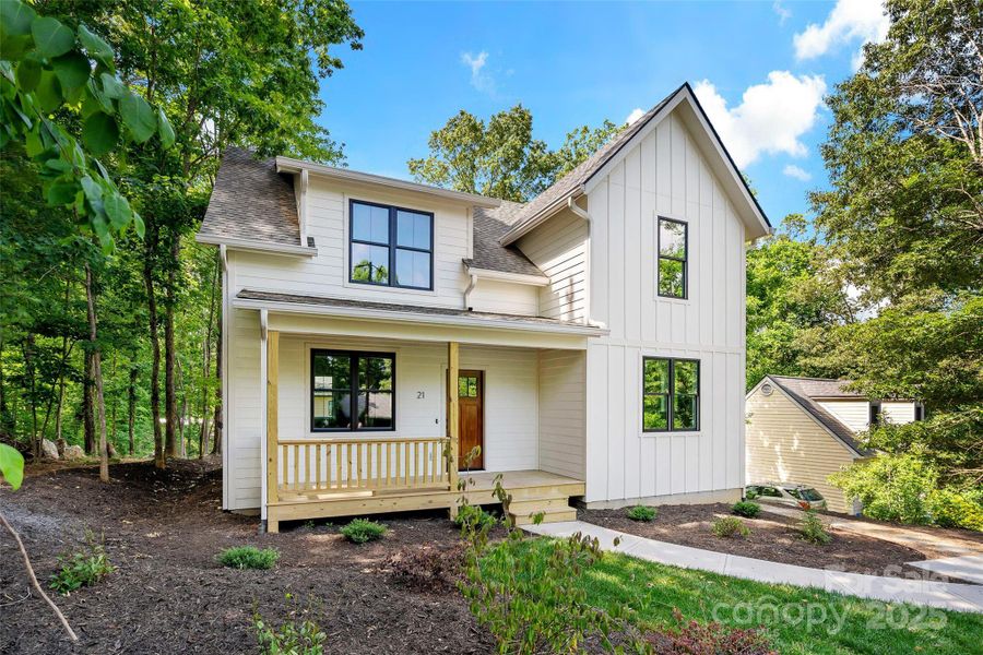 Front exterior of a new home in , Asheville, NC, highlighting curb appeal (Image 23).