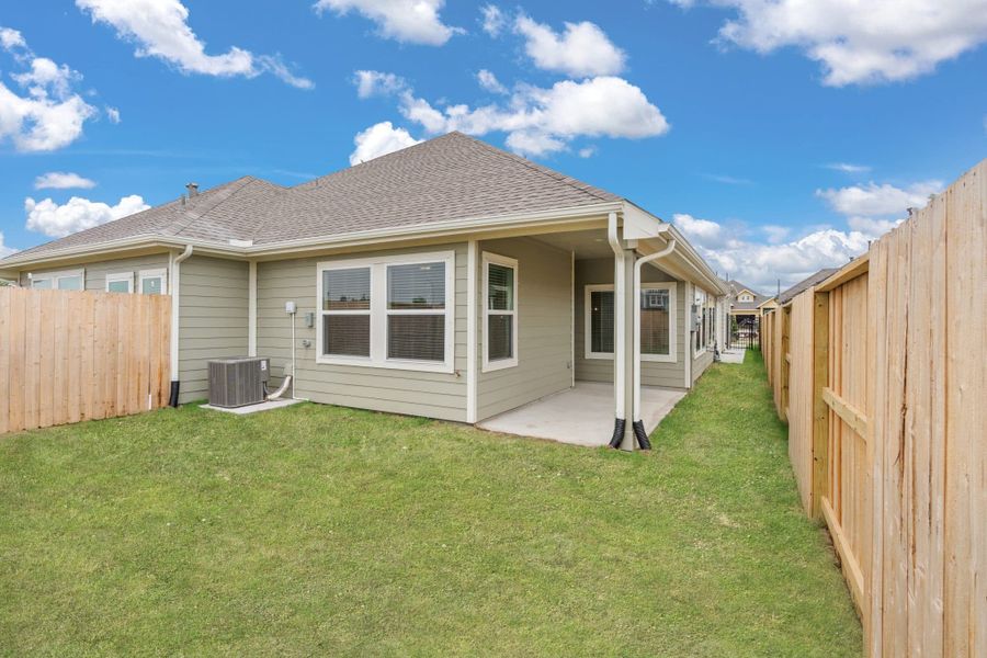 Exterior details and patio area of a home in Meridiana, Manvel (Image 14).