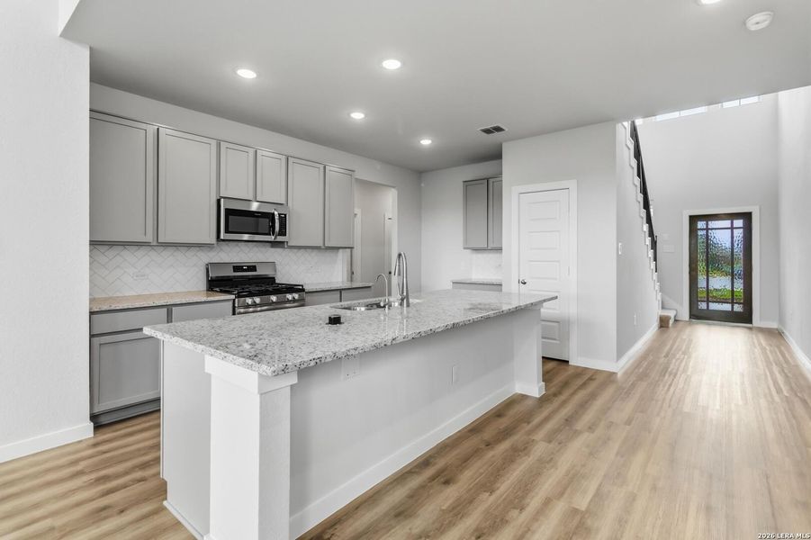 Furnished interior view inside a new home in Hickory Ridge, Elmendorf (Image 13).