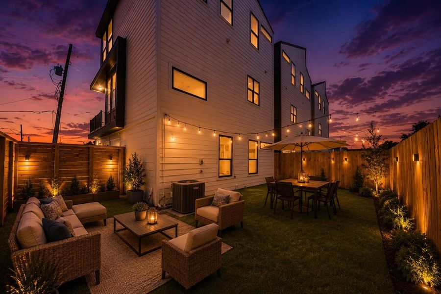 Private backyard retreat with outdoor entertaining space, ambient lighting, & no HOA or deed restrictions for added freedom & flexibility.