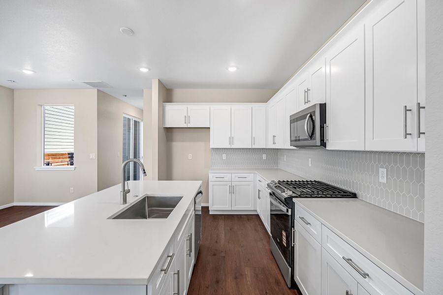 Furnished interior view inside a new home in Barefoot Village, Firestone (Image 6).