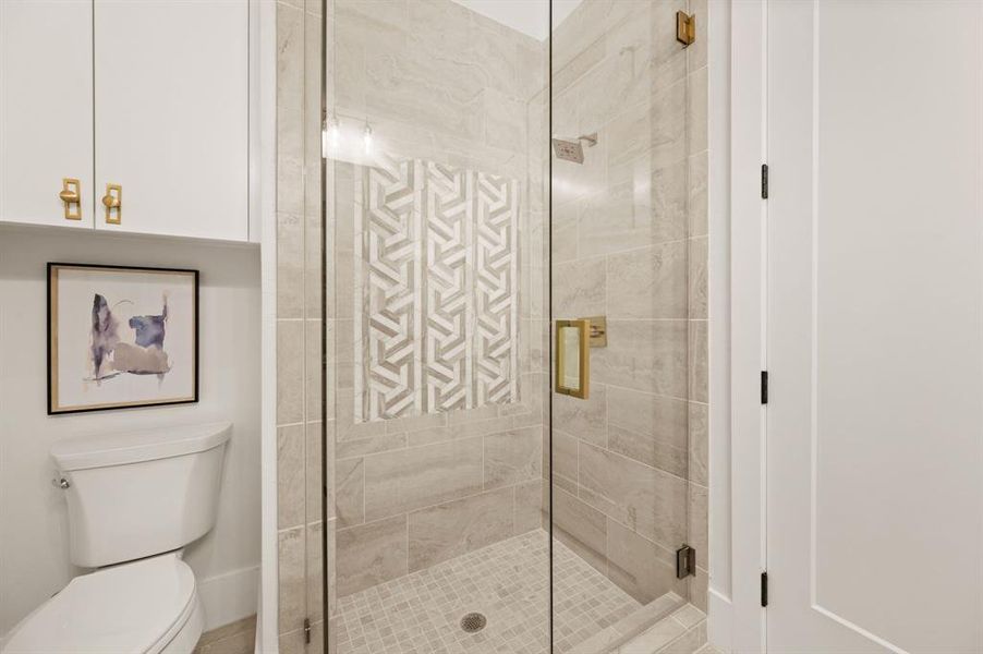 Downstairs Guest Bathroom featuring a walk-in shower