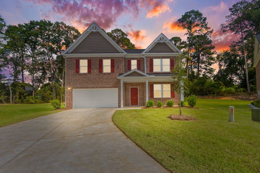 Front exterior of a new home in Heritage Bay, Sumter, SC, highlighting curb appeal (Image 1). Front exterior of a new home in Heritage Bay, Sumter, SC, highlighting curb appeal (Image 1).