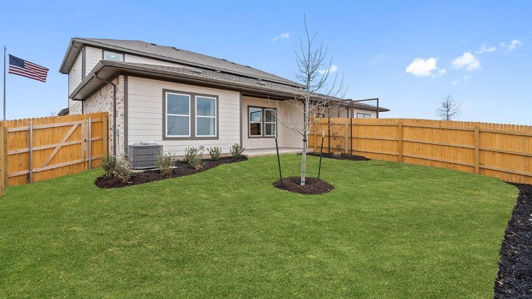 Front exterior of a new home in Palomino, Manor, TX, highlighting curb appeal (Image 23).