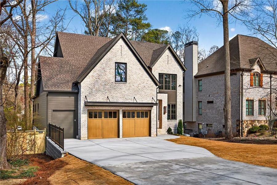 Front exterior of a new home in , Brookhaven, GA, highlighting curb appeal (Image 2). Front exterior of a new home in , Brookhaven, GA, highlighting curb appeal (Image 2).