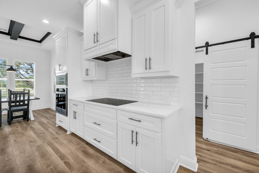 Representative furnished interior of a home built from the Lakeshore by Zeal Home Builders in Oak Water Ranch, Granbury (Image 9). Representative furnished interior of a home built from the Lakeshore by Zeal Home Builders in Oak Water Ranch, Granbury (Image 9).