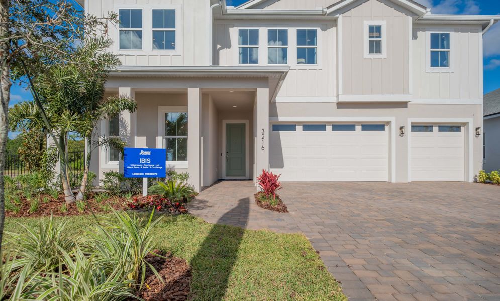Representative exterior photo of a completed home built from the Ibis by Jones Homes USA in Legends Preserve, Daytona Beach, FL (Image 23).