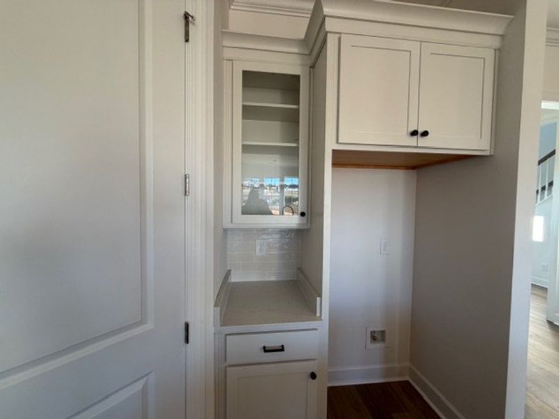 7344 Dutch River Cir., Kitchen Cabinet with Glass and Refrigerater Space