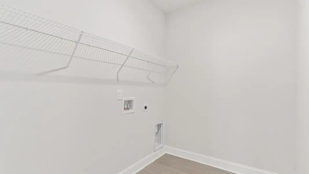 Representative unfurnished interior of a home built from the Covington by D.R. Horton in The Highlands at Cedar Hill Landing, Navassa (Image 31).