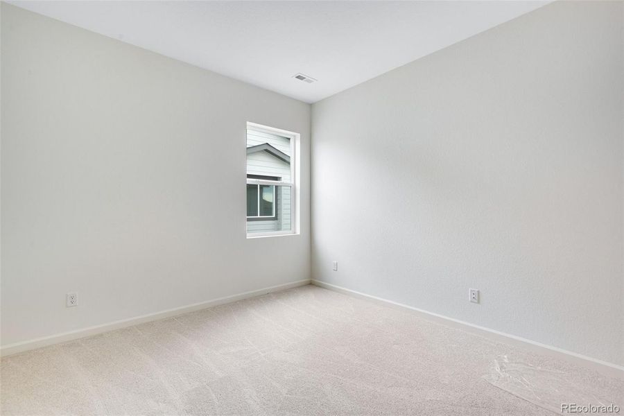 Spacious, unfurnished interior of a new home in Reunion, Commerce City (Image 34).