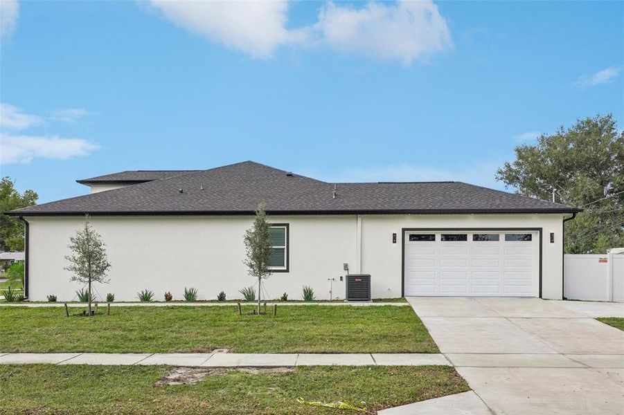 Front exterior of a new home in , Clearwater, FL, highlighting curb appeal (Image 32). Front exterior of a new home in , Clearwater, FL, highlighting curb appeal (Image 32).
