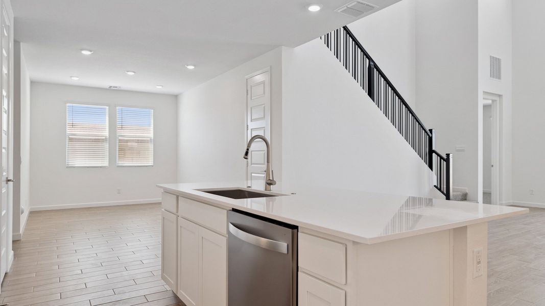 Representative furnished interior of a home built from the Apache by D.R. Horton in Zanjero Pass, Glendale (Image 9).
