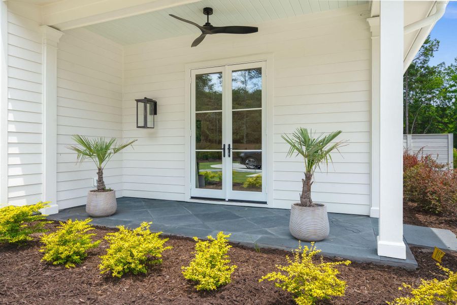 Exterior details and patio area of a home in , Johns Island (Image 44).