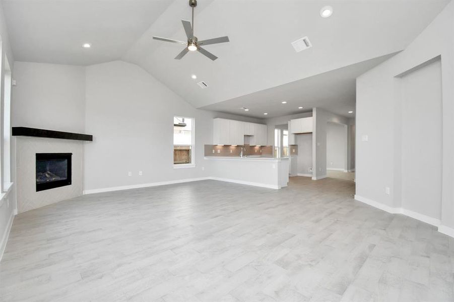 Take another glimpse into the heart of the home with this additional view of the family room—a sprawling space ready to accommodate all your gatherings.