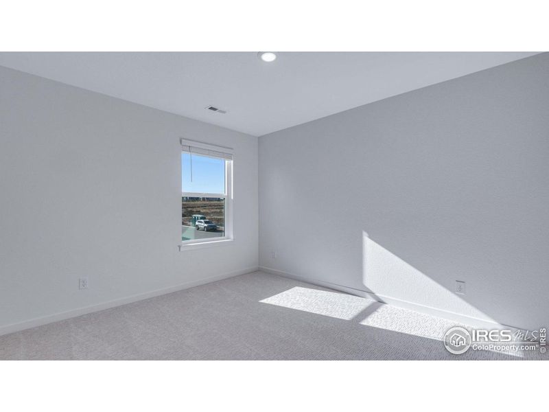 Spacious, unfurnished interior of a new home in Vista Meadows, Fort Lupton (Image 30).