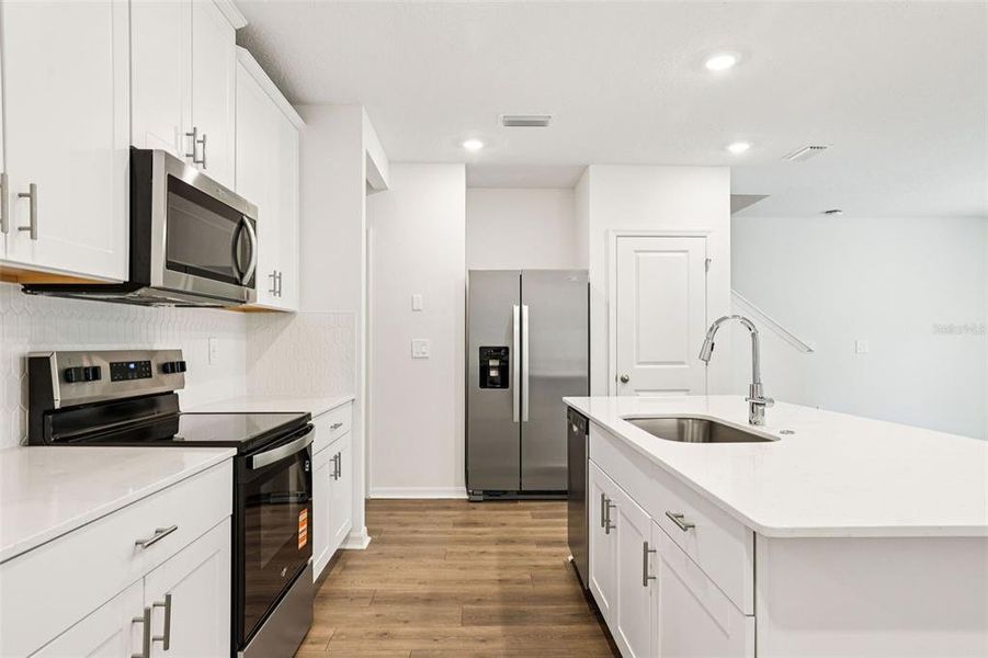 Furnished interior view inside a new home in Bradford Park, Ormond Beach (Image 7).