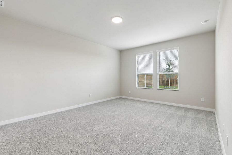 Primary Suite in the Winters home plan by Trophy Signature Homes – REPRESENTATIVE PHOTO