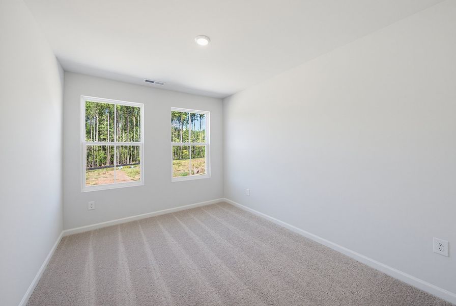 Spacious, unfurnished interior of a new home in Sweetbrier, Durham (Image 26).