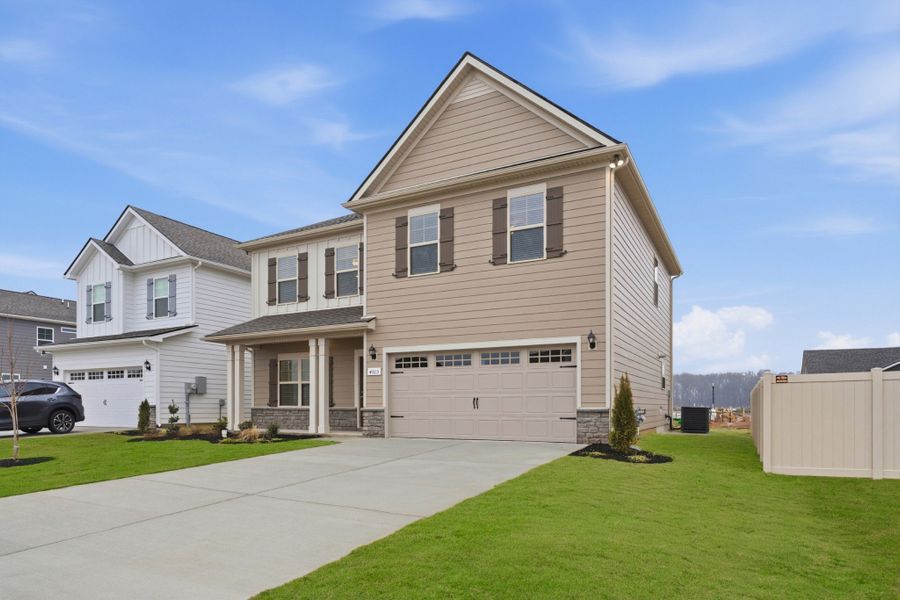 Front exterior of a new home in Salem Landing, Rockvale, TN, highlighting curb appeal (Image 18). Front exterior of a new home in Salem Landing, Rockvale, TN, highlighting curb appeal (Image 18).