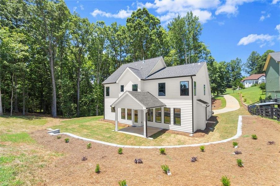 Front exterior of a new home in , Cumming, GA, highlighting curb appeal (Image 28). Front exterior of a new home in , Cumming, GA, highlighting curb appeal (Image 28).