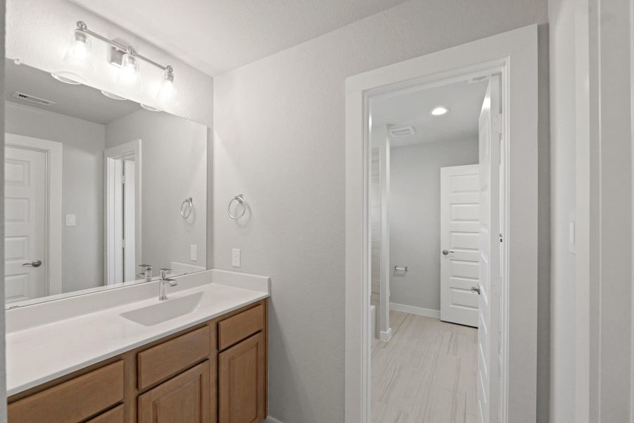 Furnished interior view inside a new home in Briarwood Crossing, Rosenberg (Image 13).
