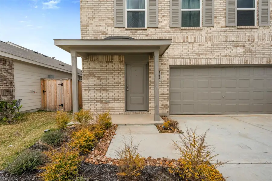 Welcoming covered front entry.