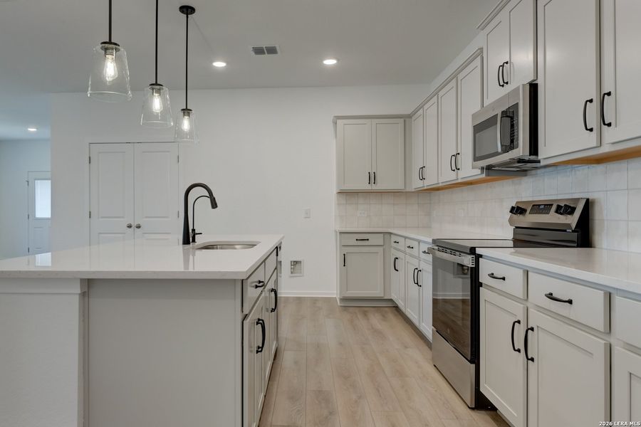 Furnished interior view inside a new home in Hennersby Hollow, San Antonio (Image 10).