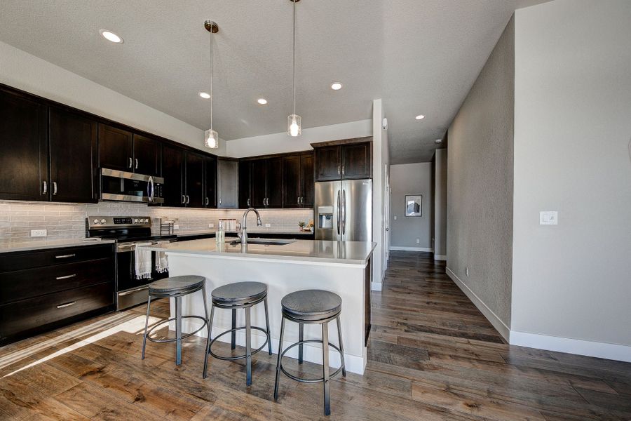 Representative furnished interior of a home built from the The Devon by Landmark Homes in The Lakes at Centerra, Loveland (Image 11). Representative furnished interior of a home built from the The Devon by Landmark Homes in The Lakes at Centerra, Loveland (Image 11).
