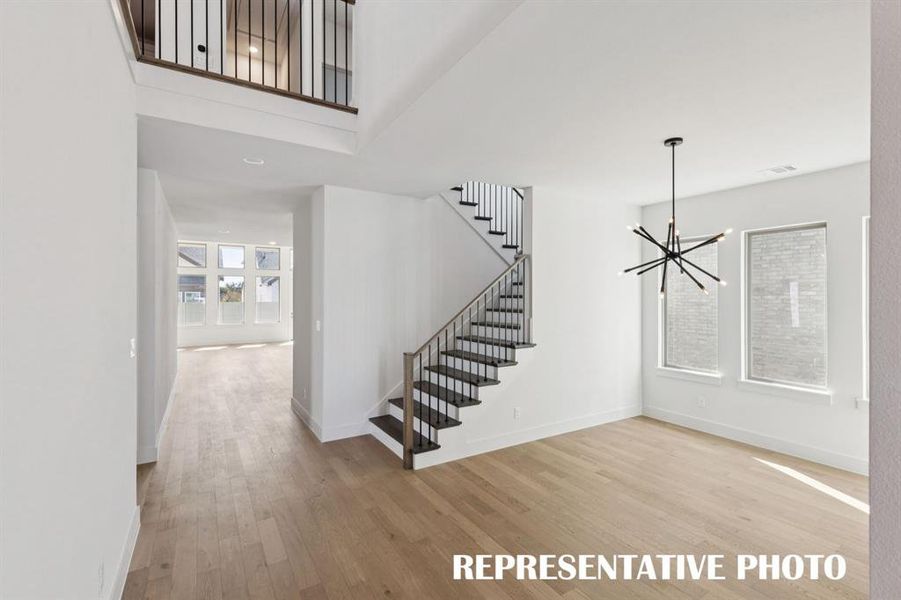 Welcome into your new dream home featuring site lines from the front to the rear of the home and a spacious light filled dining room perfect for grand dinner parties!  REPRESENTATIVE PHOTO