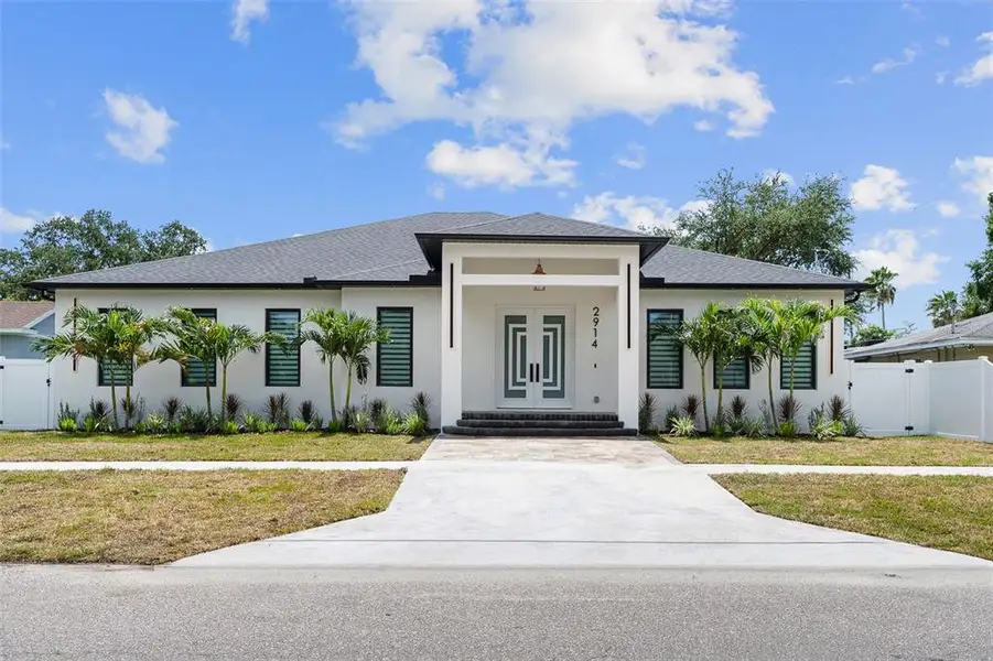 Front exterior of a new home in , Tampa, FL, highlighting curb appeal (Image 27). Front exterior of a new home in , Tampa, FL, highlighting curb appeal (Image 27).