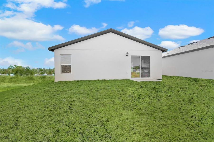 Exterior details and patio area of a home in Tula Parc, Astatula (Image 3). Exterior details and patio area of a home in Tula Parc, Astatula (Image 3).