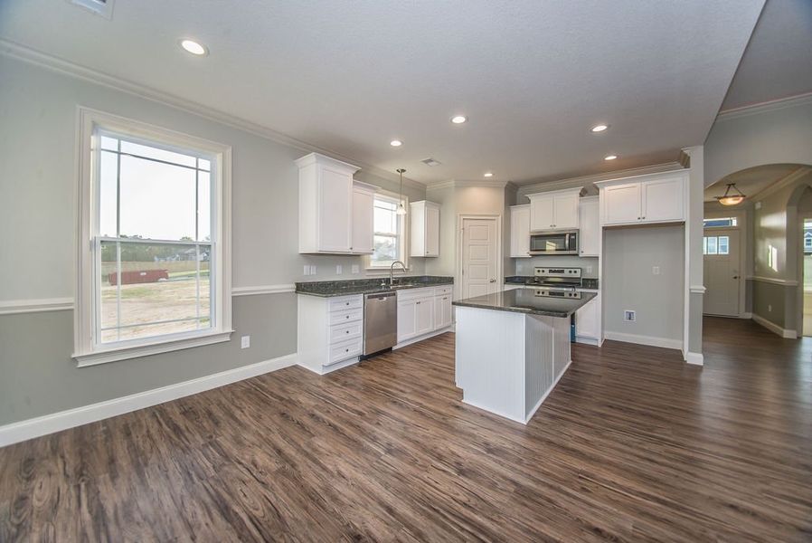 Representative furnished interior of a home built from the Mediterranean by Enchanted Homes in Lonesome Dove, San Antonio (Image 7).