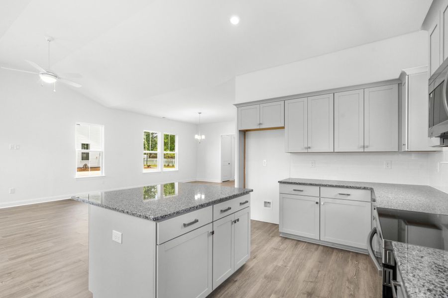 Furnished interior view inside a new home in Downtown Loris Homes, Loris (Image 14).