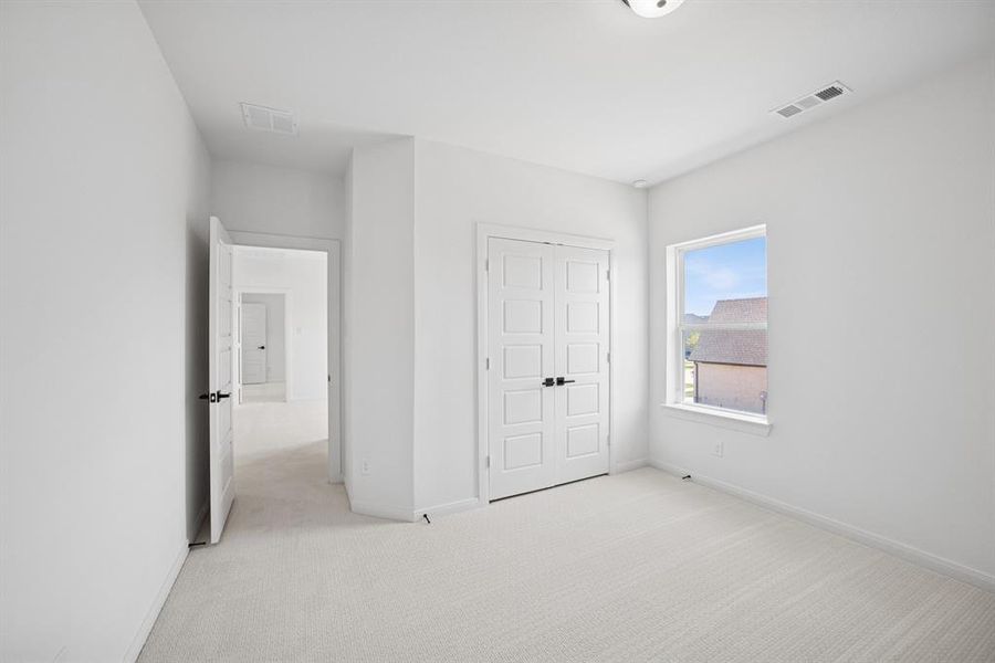Spacious, unfurnished interior of a new home in Pecan Square - Gardens, Northlake (Image 25). Spacious, unfurnished interior of a new home in Pecan Square - Gardens, Northlake (Image 25).