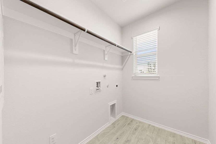 Front exterior of a new home in Northspur, Terrell, TX, highlighting curb appeal (Image 25). Front exterior of a new home in Northspur, Terrell, TX, highlighting curb appeal (Image 25).