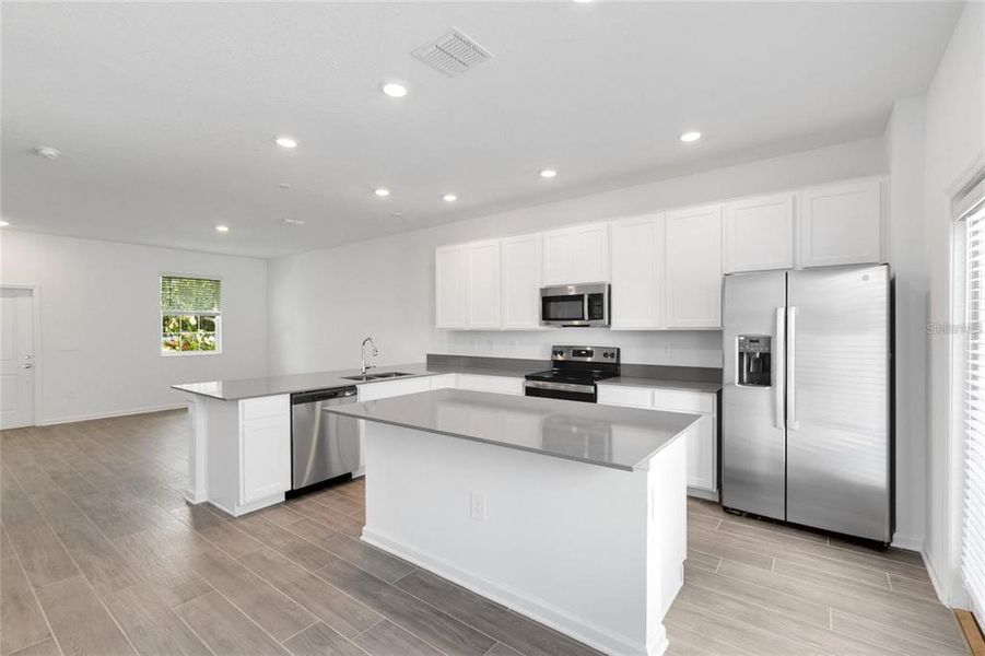 Furnished interior view inside a new home in , Winter Garden (Image 11).