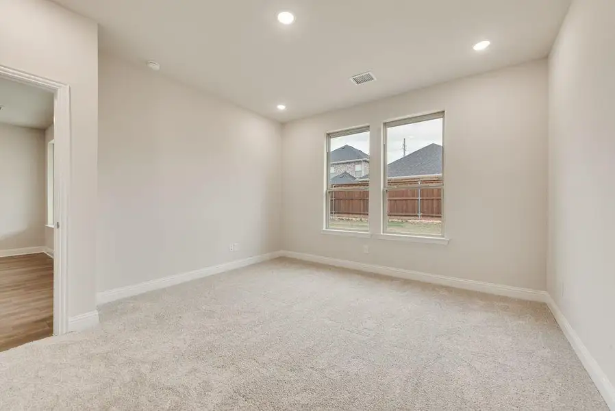 Spacious, unfurnished interior of a new home in Spiritas Ranch, Little Elm (Image 19).