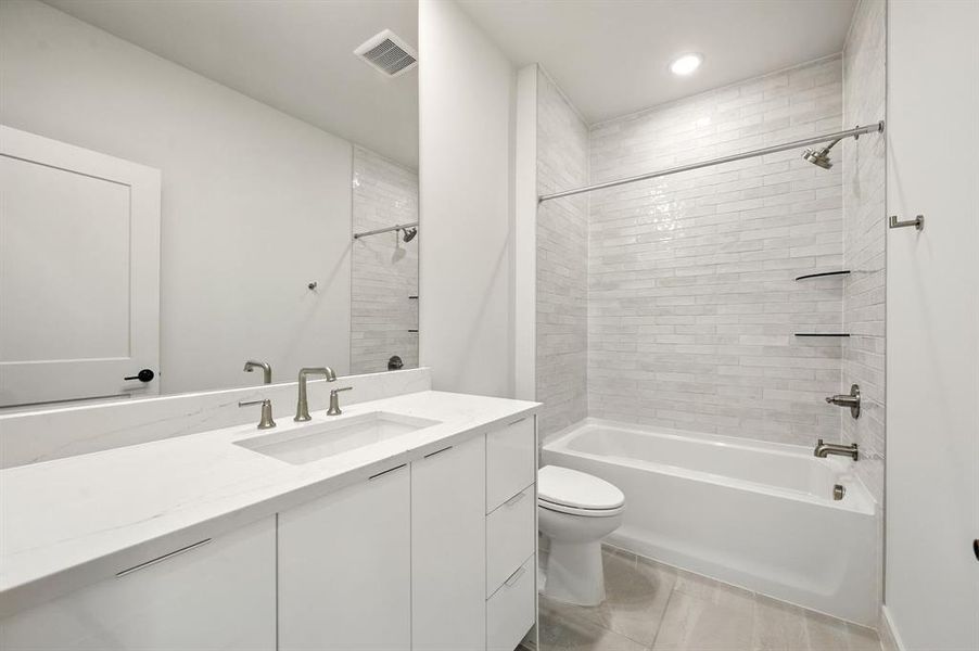 Your guests will feel right at home in this beautifully finished guest bath adjacent to the main floor guest room. Your guests will feel right at home in this beautifully finished guest bath adjacent to the main floor guest room.
