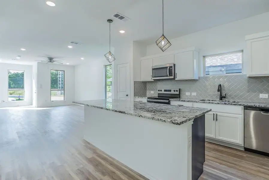 Furnished interior view inside a new home in , Dallas (Image 11). Furnished interior view inside a new home in , Dallas (Image 11).