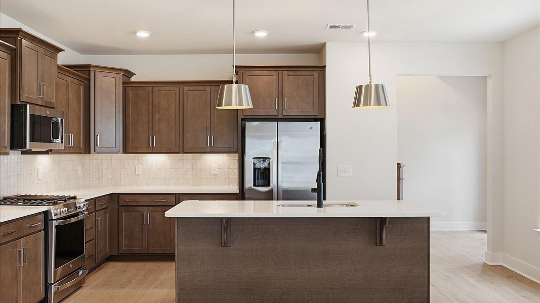 Furnished interior view inside a new home in Village at Midway, Anderson (Image 12).