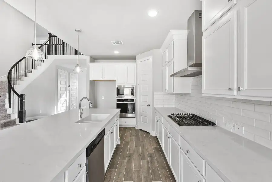 Furnished interior view inside a new home in Grand Central Park, Conroe (Image 11).
