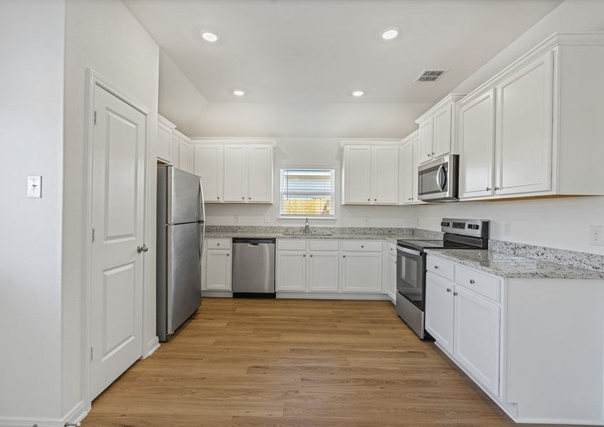 Chef-ready kitchen with stainless steel appliances and granite countertops