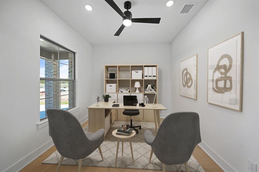 Home office featuring light wood finished floors, recessed lighting, and a ceiling fan