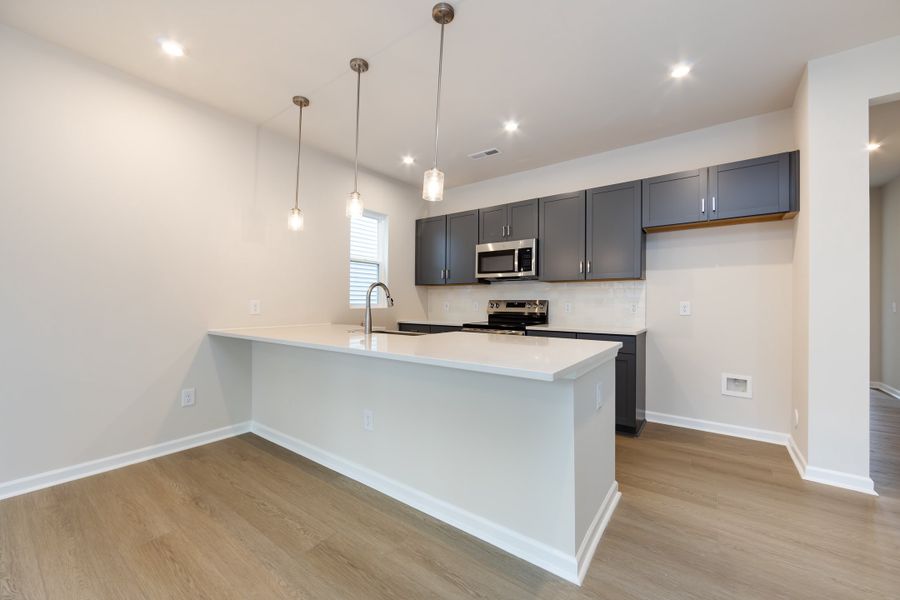 Furnished interior view inside a new home in Fifteen 15 Cannon, Charlotte (Image 7).