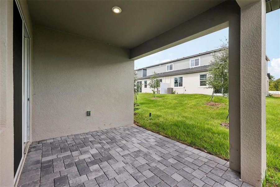Exterior details and patio area of a home in Cyrene at Minneola, Minneola (Image 23).