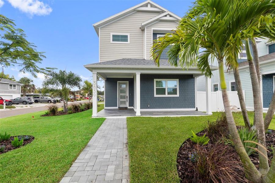 Front exterior of a new home in , St. Petersburg, FL, highlighting curb appeal (Image 25).